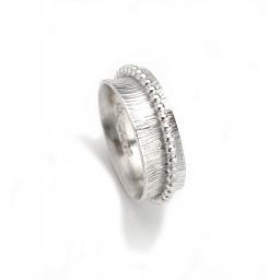 Hand made Sterling Silver 'Bark' textured 'Spinning' Ring with beaded, Sterling Silver 'spinner'.