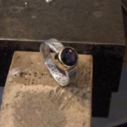 Sterling Silver Ring using our customer's own stone, set into 9ct Yellow Gold.
