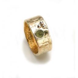 Hand made and textured 9ct Yellow Gold Ring, with an unpolished Green Tourmaline and Silver Granules
