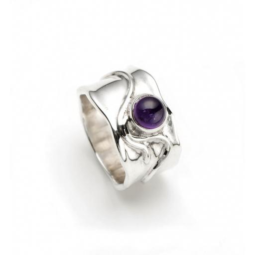 Sterling Silver Ring set with Amethyst and wire wave decoration.